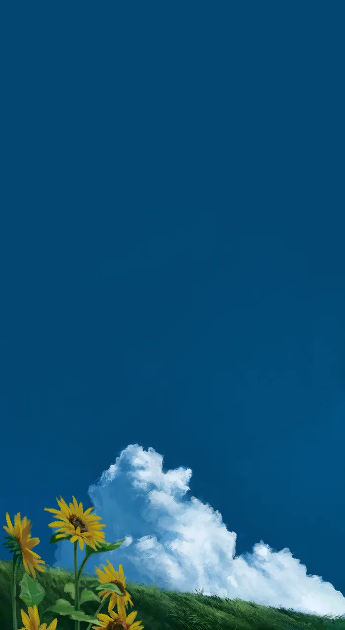 Sunflowers on a green hillside beneath a tall white cloud and a deep blue sky.